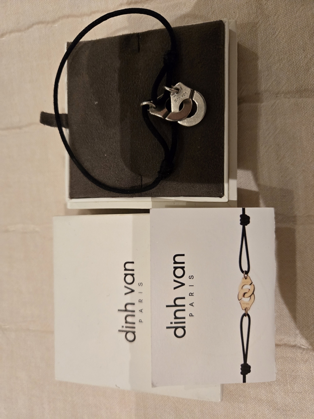 Dinh Van Black Cord Bracelet with Interlocking Silver Charm